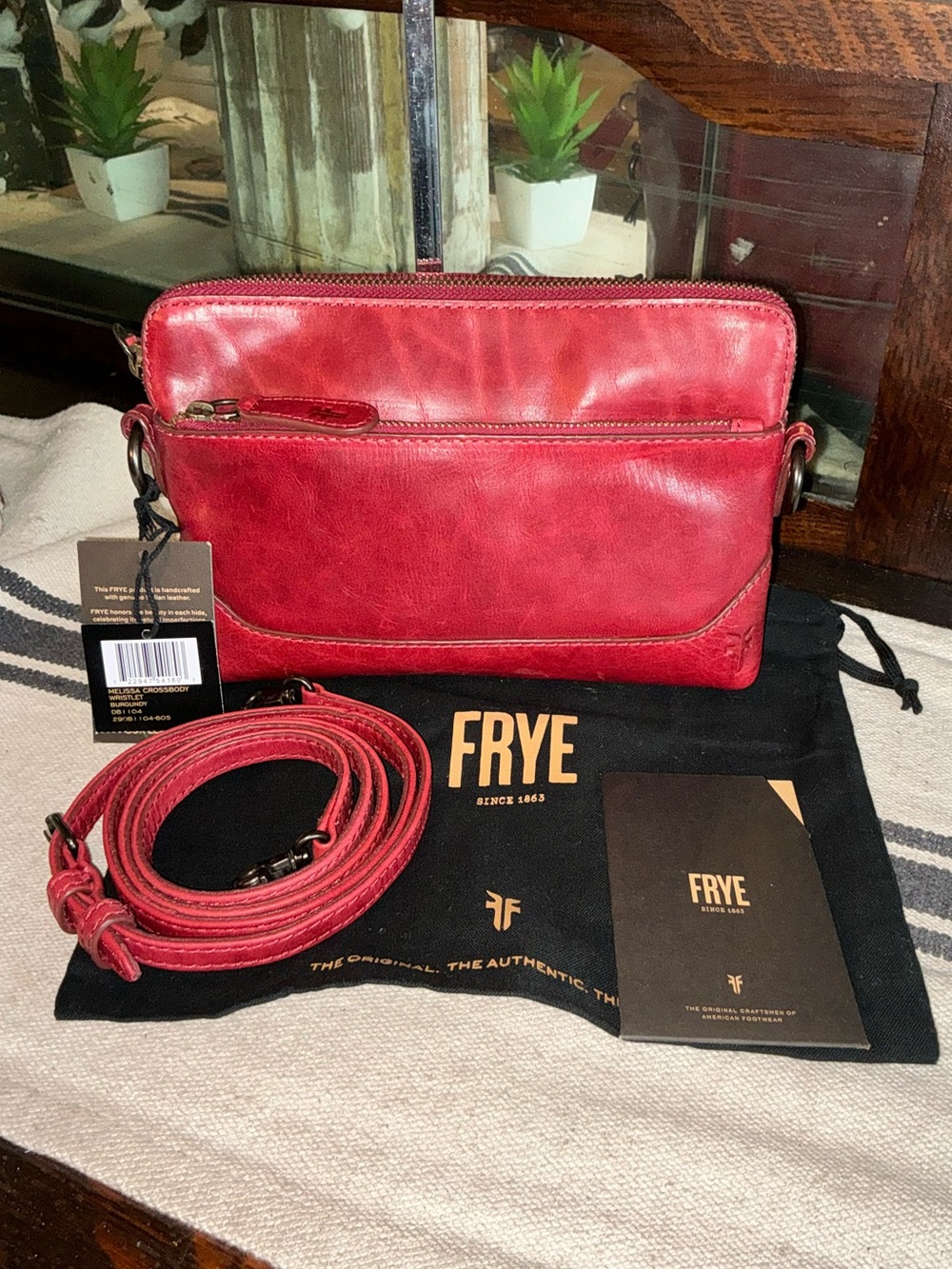 Frye Red brooch